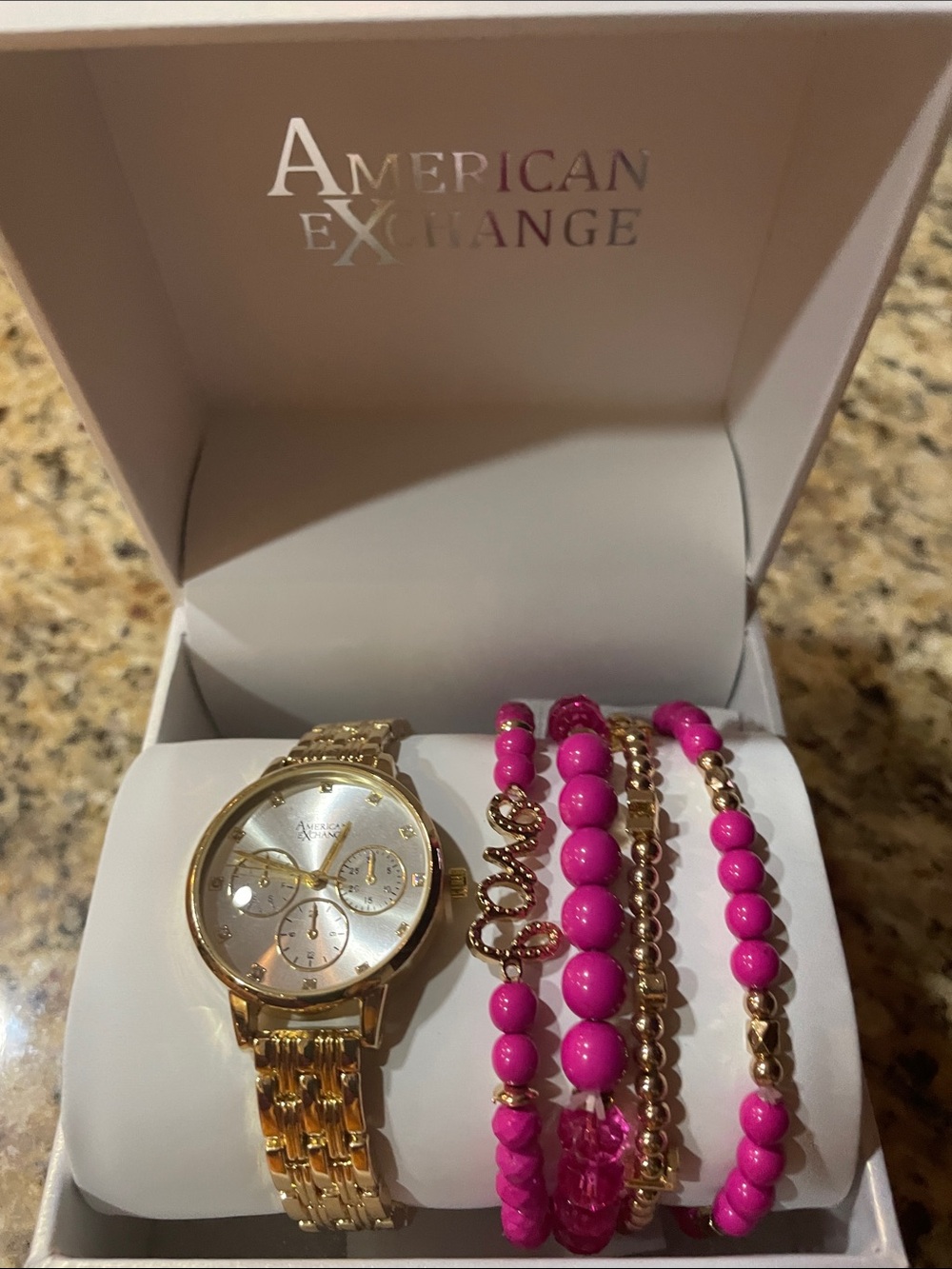 American Exchange Gold Watch with Hot Pink Beaded Bracelet Stack